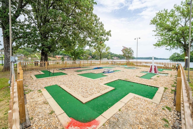 5371 Central Ave Unit 1B, Hot Springs, AR 72210 - surrounding community with an area to practice putting, fence, and a water view
