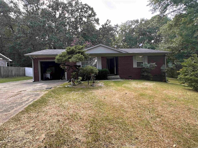 single story home with a front lawn and a garage