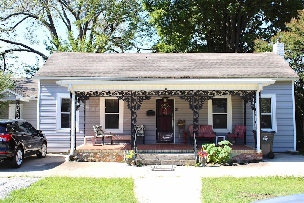 bungalow-style home with a porch