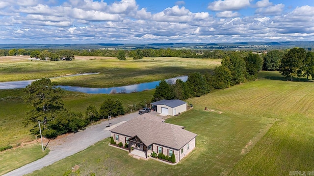 aerial view featuring a rural view and a water view