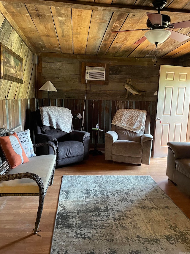 living room featuring wooden walls, ceiling fan, wooden ceiling, and a wall mounted AC