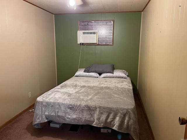 bedroom with ornamental molding and carpet flooring