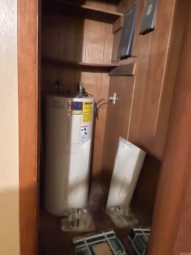 utility room with water heater