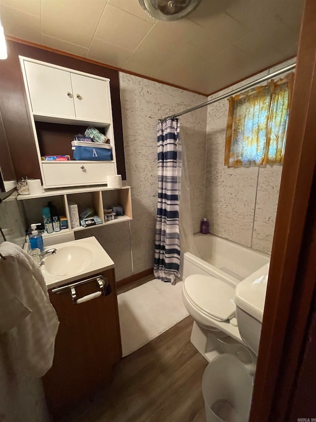 full bathroom with shower / bath combination with curtain, vanity, hardwood / wood-style floors, and toilet