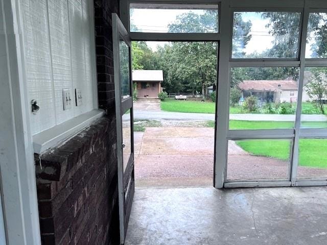 doorway with concrete flooring