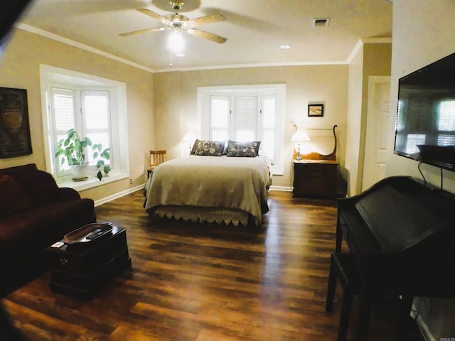 bedroom with ceiling fan, dark hardwood / wood-style floors, and crown molding