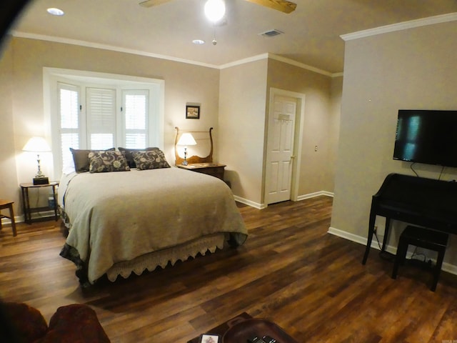 bedroom with ornamental molding, dark hardwood / wood-style floors, and ceiling fan