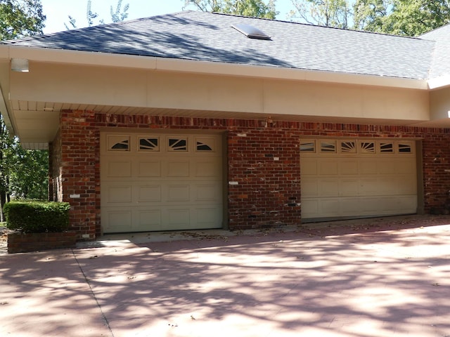 exterior space with a garage