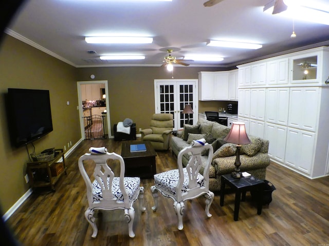 living room with french doors, ornamental molding, dark hardwood / wood-style flooring, and ceiling fan