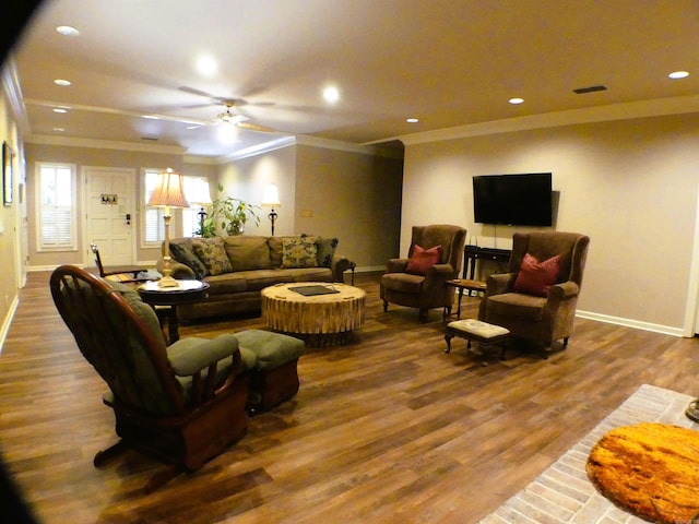 living room featuring ornamental molding, ceiling fan, and hardwood / wood-style flooring