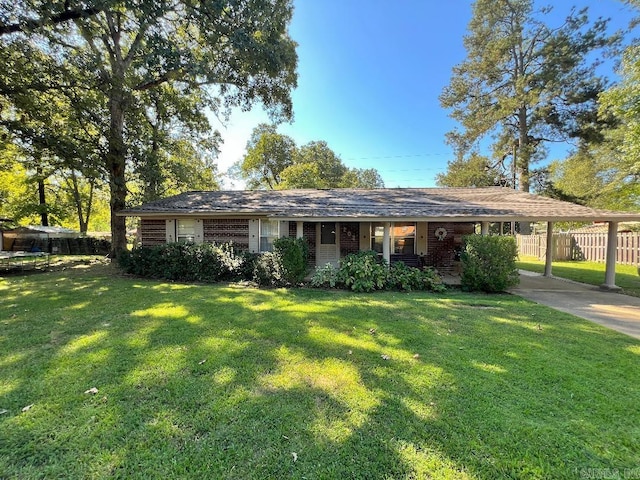 ranch-style house with a front lawn and a carport