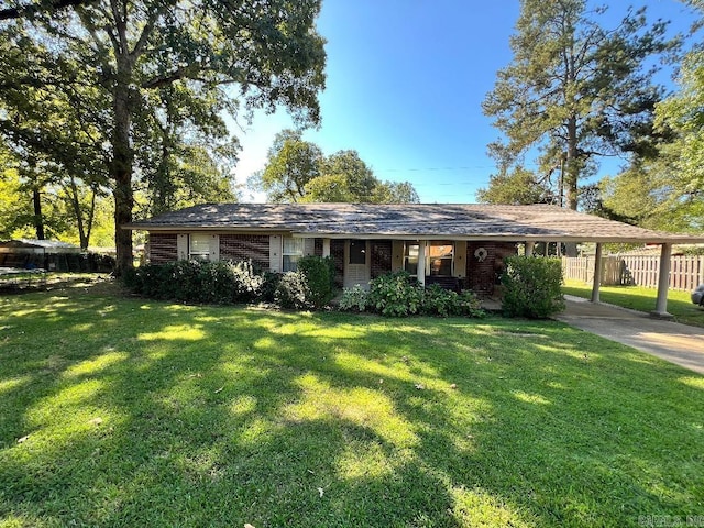 ranch-style house with a front lawn