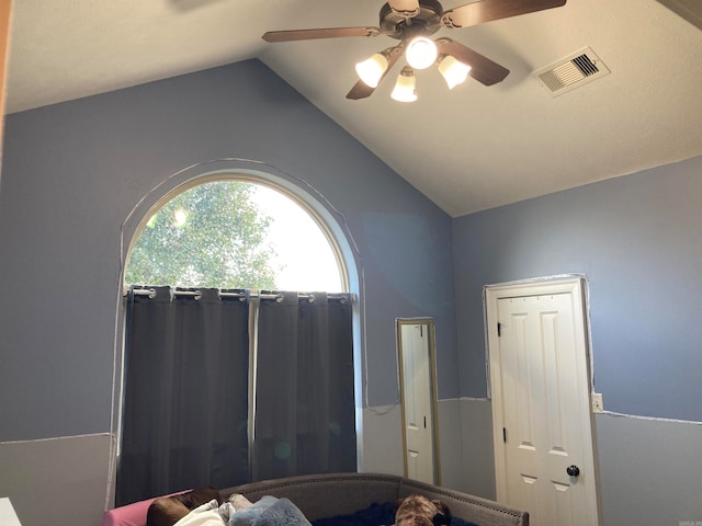 bedroom featuring vaulted ceiling and ceiling fan