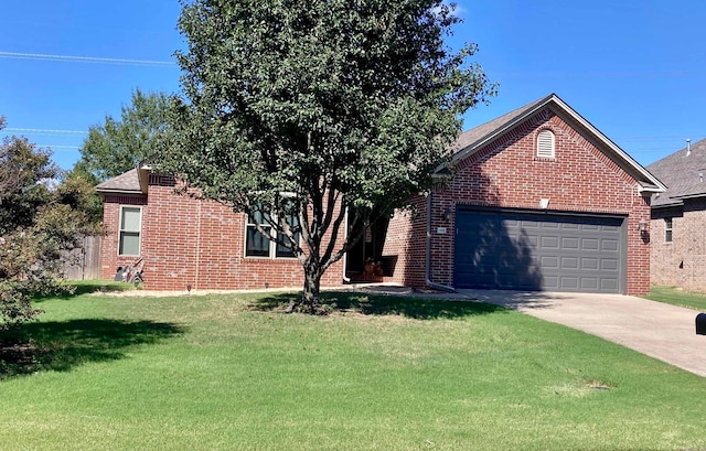 front of property featuring a front yard and a garage