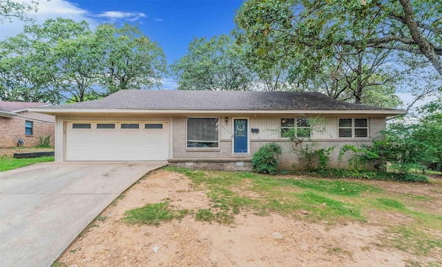 single story home with a garage