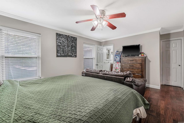 bedroom featuring ornamental molding, dark hardwood / wood-style floors, and ceiling fan