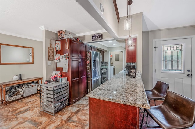 kitchen featuring kitchen peninsula, decorative light fixtures, stainless steel appliances, light stone countertops, and a kitchen bar