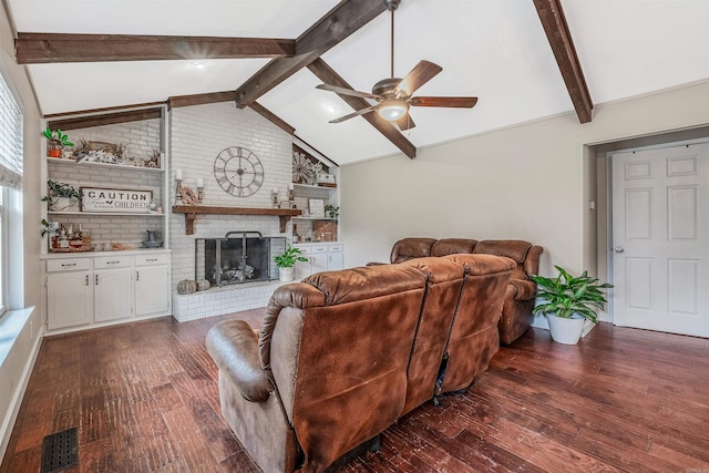 living room with a fireplace, lofted ceiling with beams, dark hardwood / wood-style floors, and ceiling fan