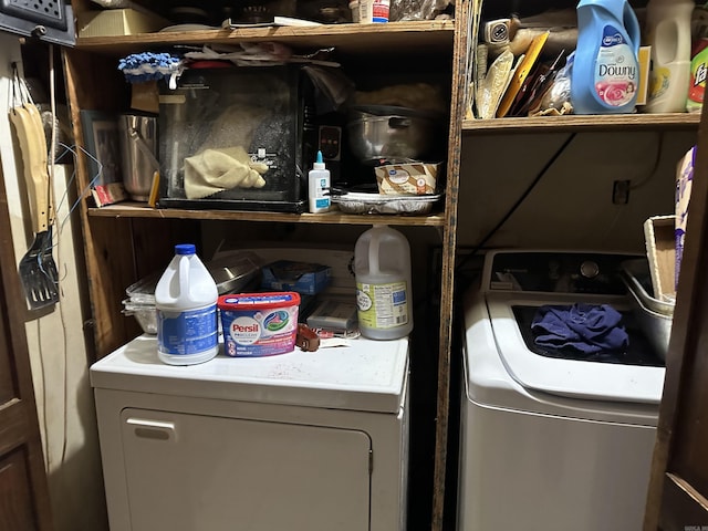 laundry area with separate washer and dryer