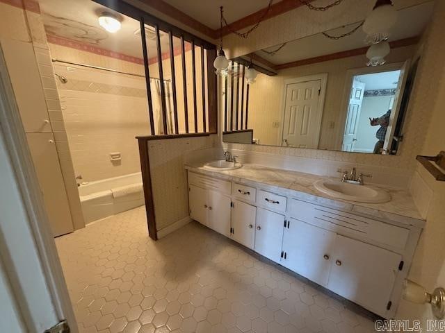 bathroom with vanity, bathtub / shower combination, and tile patterned flooring