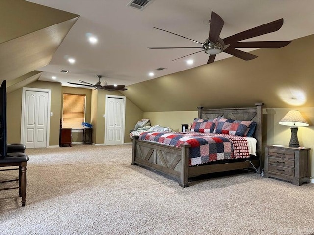 bedroom featuring vaulted ceiling, ceiling fan, and carpet floors