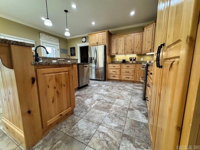 kitchen with decorative light fixtures, stainless steel appliances, ornamental molding, and dark stone counters