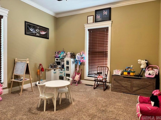 playroom featuring carpet flooring and ornamental molding