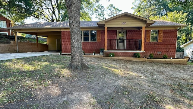 view of front facade with a carport and a porch