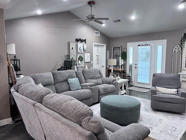 cinema room featuring vaulted ceiling and ceiling fan