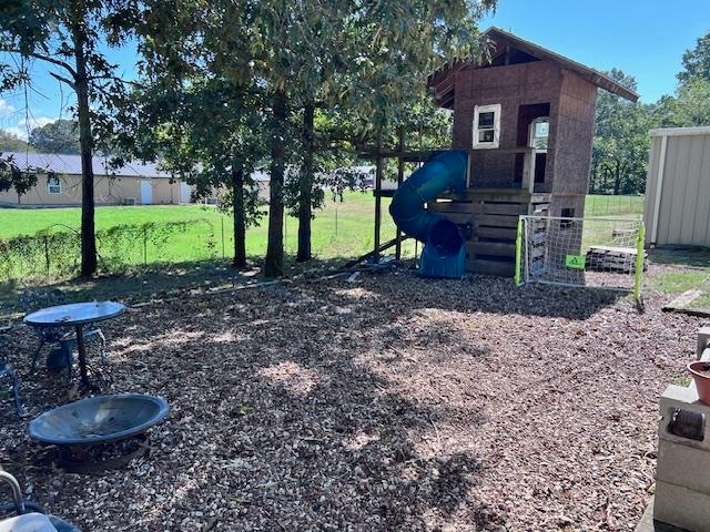 view of yard featuring a playground