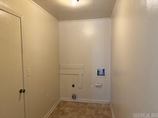 1912 Old County Rd, Pocahontas, AR 72455 - laundry area featuring ornamental molding, hookup for a washing machine, baseboards, electric dryer hookup, and laundry area