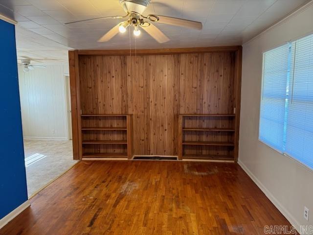1912 Old County Rd, Pocahontas, AR 72455 - empty room with baseboards, wood finished floors, and a ceiling fan