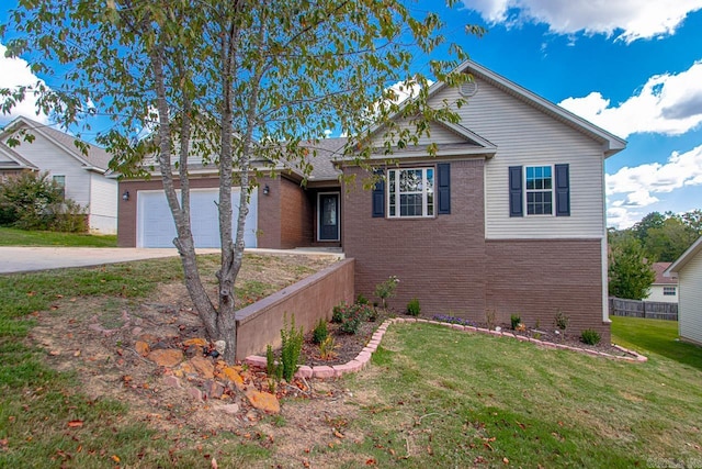 view of front of property with a garage and a front lawn