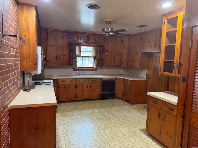 kitchen featuring ceiling fan, stove, sink, backsplash, and dishwasher