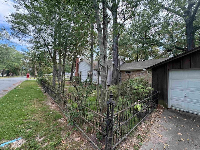 view of yard featuring a garage