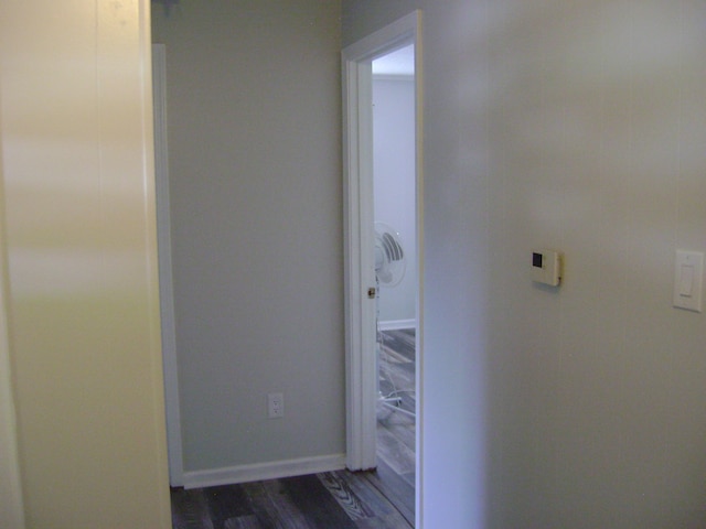 hall with dark hardwood / wood-style floors