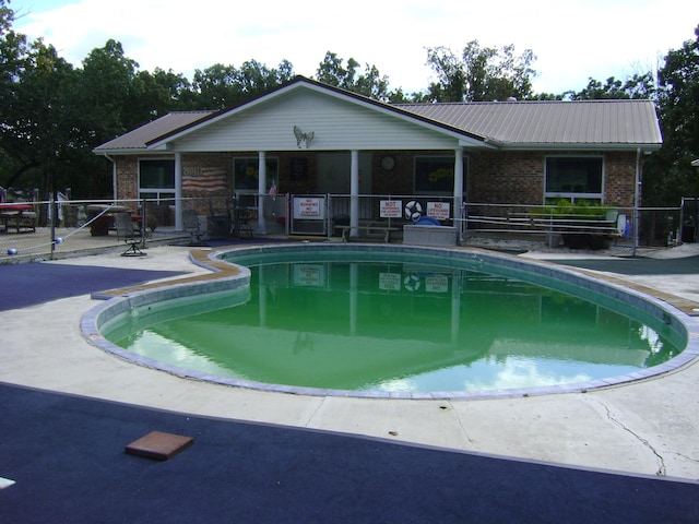 view of pool with a patio area