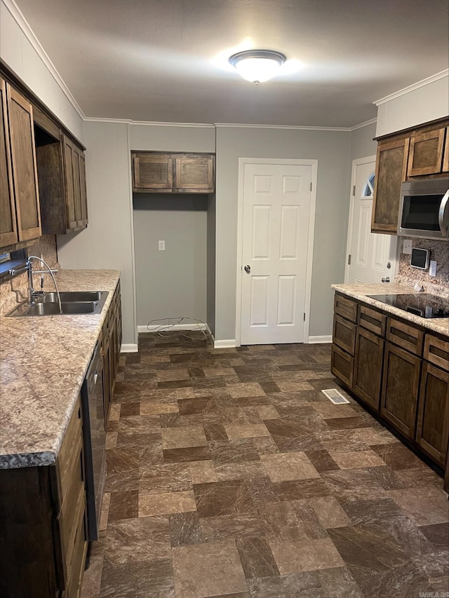 kitchen featuring light stone counters, ornamental molding, sink, dark brown cabinets, and black electric cooktop