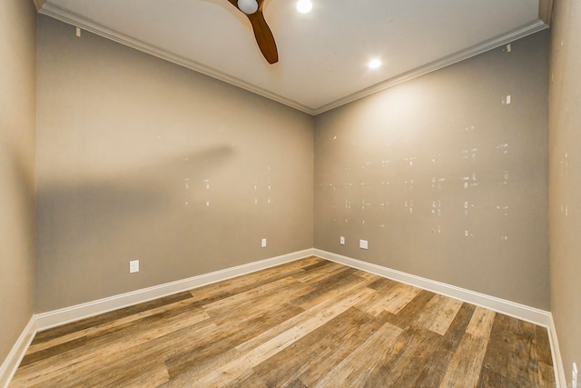 spare room with ceiling fan, hardwood / wood-style flooring, and ornamental molding