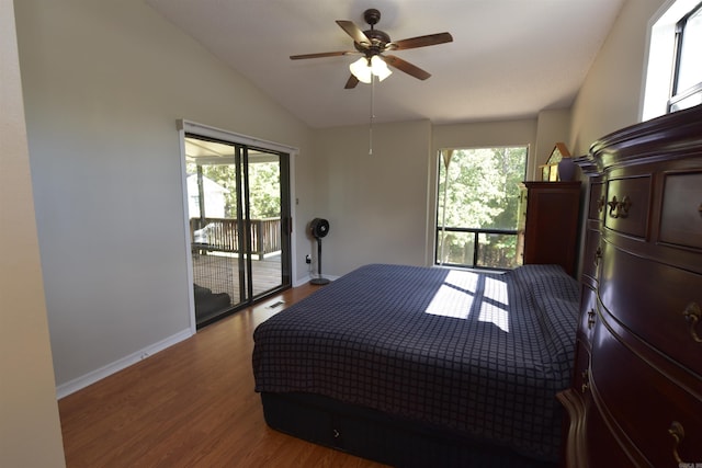 bedroom with ceiling fan, hardwood / wood-style flooring, lofted ceiling, and access to outside