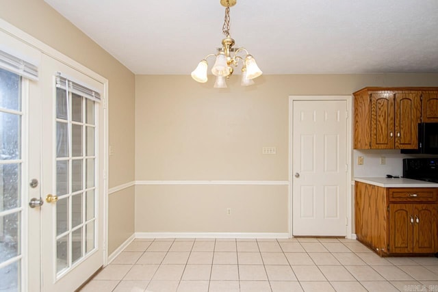 unfurnished dining area with light tile patterned flooring and a chandelier