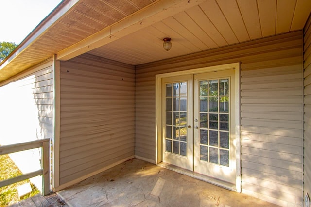 property entrance featuring french doors