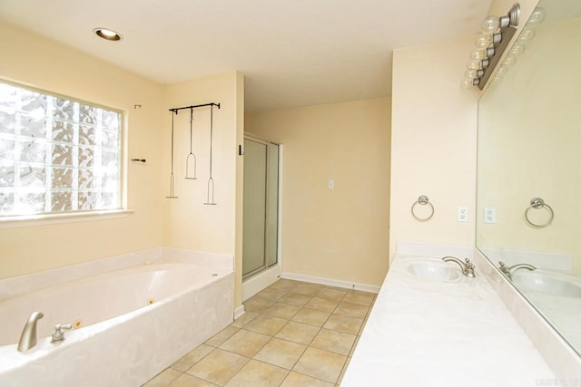 bathroom featuring shower with separate bathtub, tile patterned flooring, and vanity