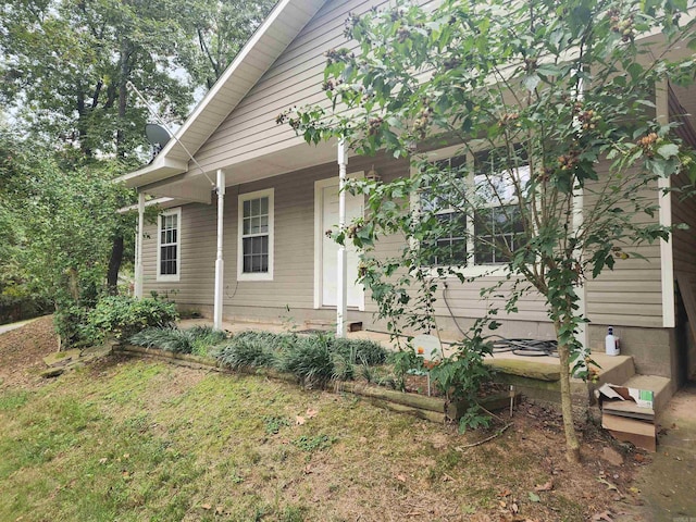 view of home's exterior featuring a porch