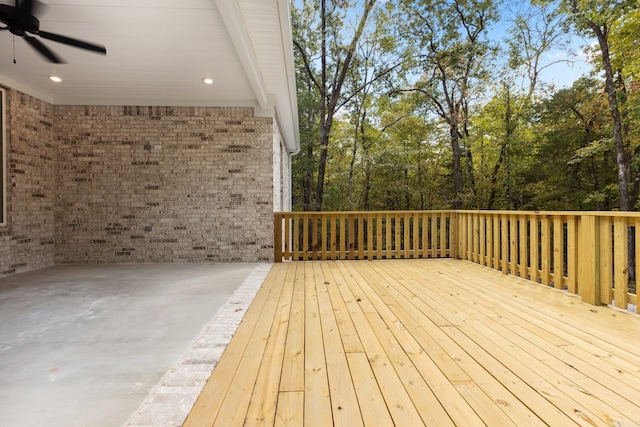 wooden deck featuring ceiling fan