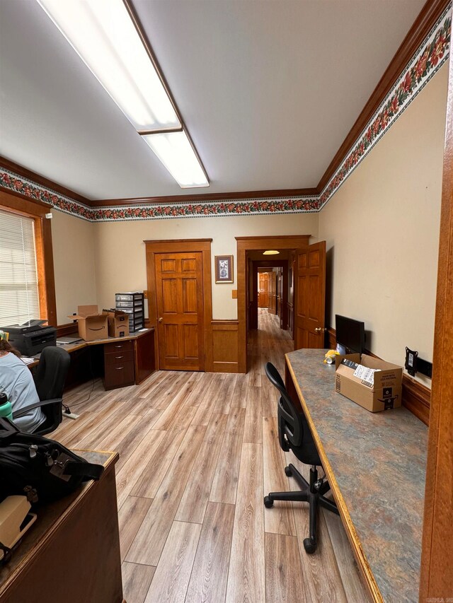 office area with crown molding and hardwood / wood-style flooring