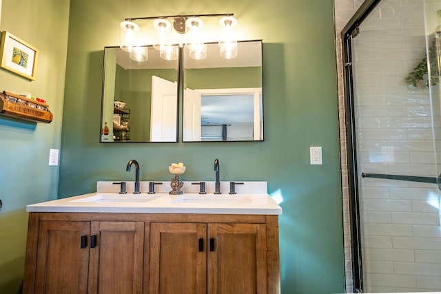 bathroom featuring walk in shower and vanity