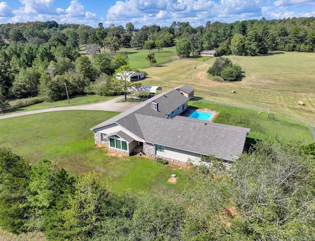 birds eye view of property with a rural view