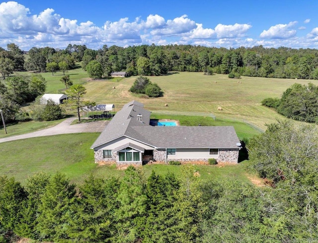 birds eye view of property featuring a rural view