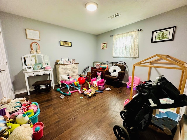 rec room with dark hardwood / wood-style flooring